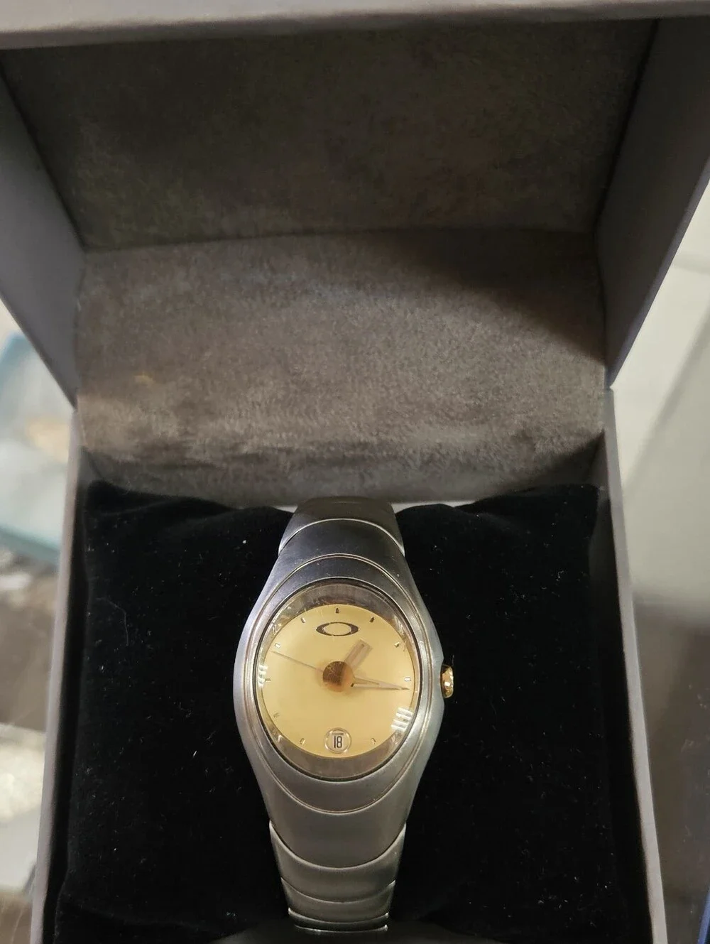 Oakley Timebomb Icon Titanium Watch with Gold Dial.